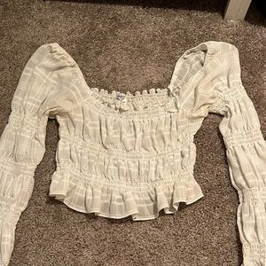 white long sleeve top with bell bottom sleeves!